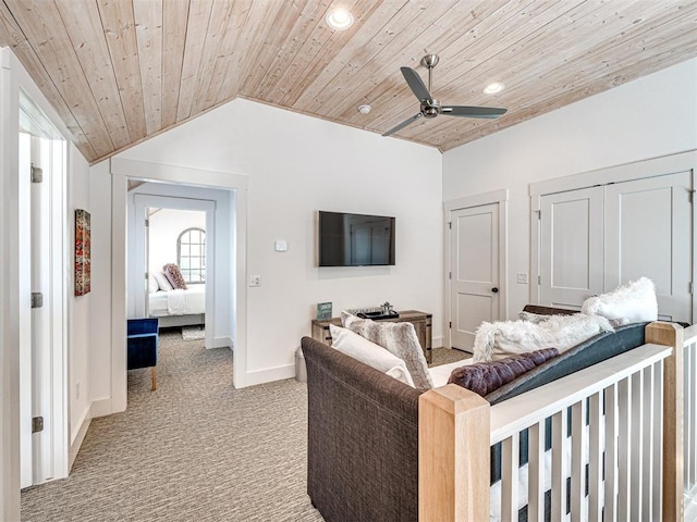 carpeted living room with vaulted ceiling, ceiling fan, and wood ceiling