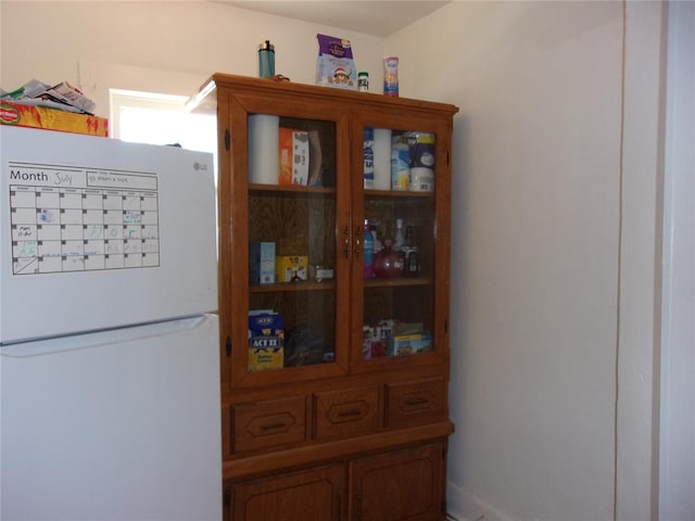 details featuring freestanding refrigerator