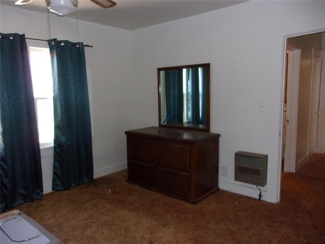 carpeted bedroom with heating unit