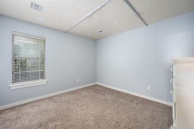 spare room with carpet flooring