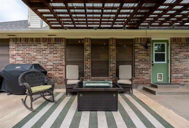 view of patio featuring a pergola and area for grilling