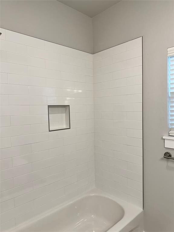 bathroom with shower / bathing tub combination