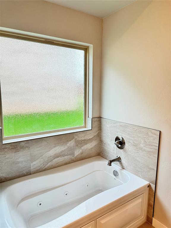 bathroom featuring a bathing tub