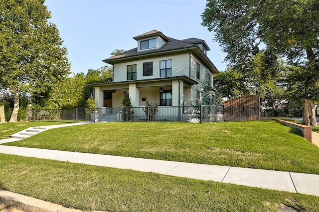 view of front of property featuring a front lawn