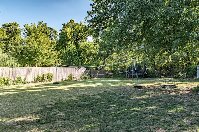 view of yard featuring volleyball court