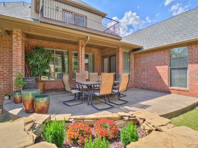 view of patio with a balcony