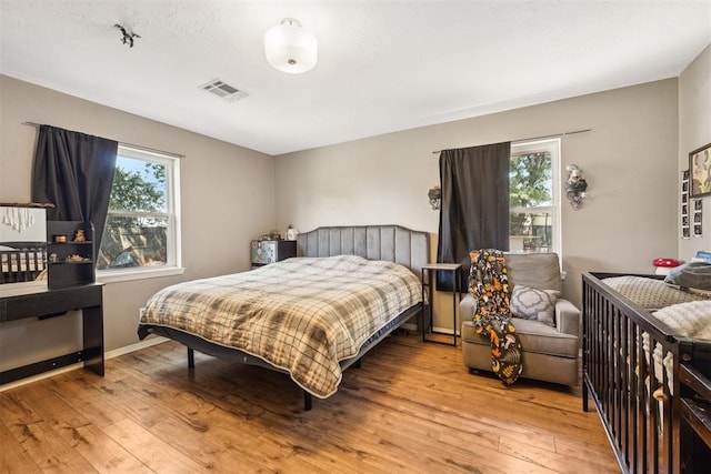 bedroom featuring light hardwood / wood-style floors