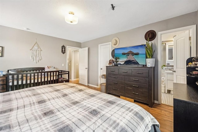 bedroom featuring light hardwood / wood-style floors