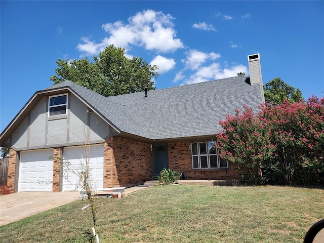 view of front of house with a garage and a front yard