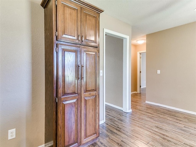 kitchen with light hardwood / wood-style floors