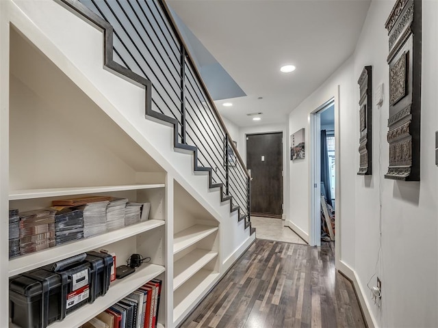 entryway with dark wood-type flooring