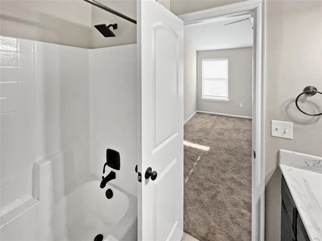 bathroom with shower / washtub combination and vanity