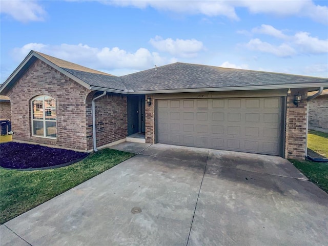 ranch-style house featuring a garage