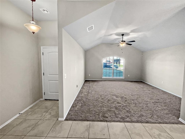 interior space with ceiling fan, light carpet, and lofted ceiling