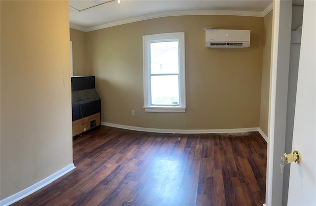 unfurnished room featuring a wall mounted air conditioner, dark hardwood / wood-style floors, and ornamental molding