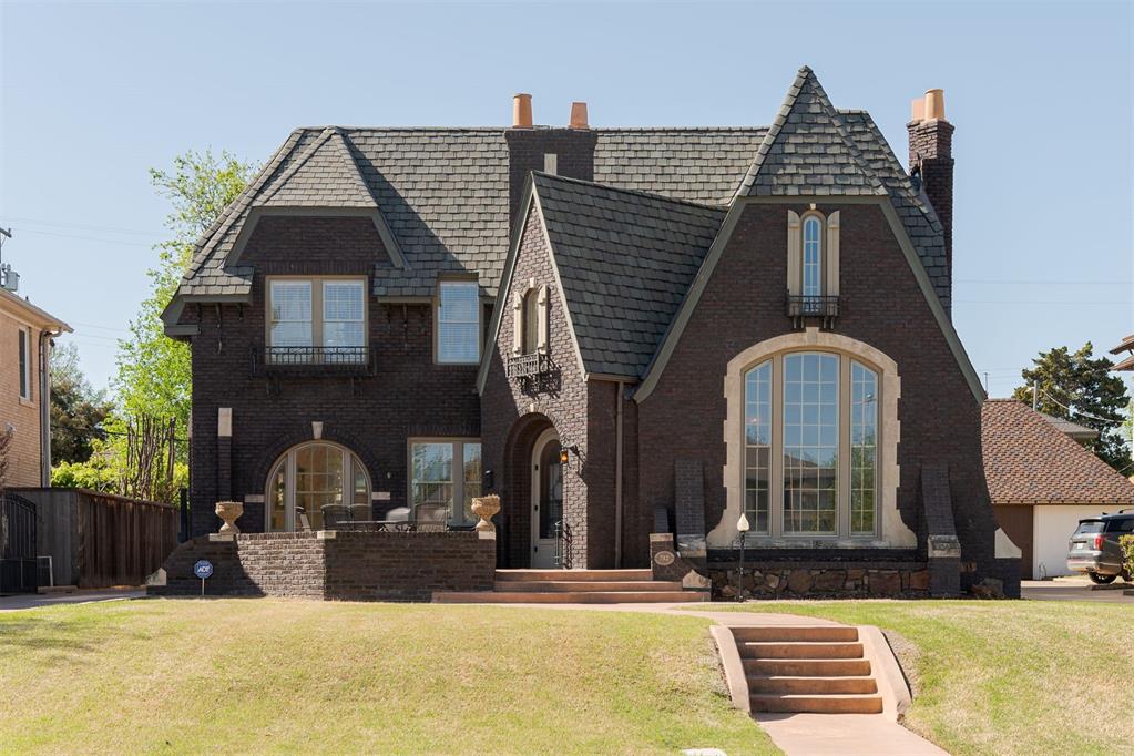 tudor house with a front yard