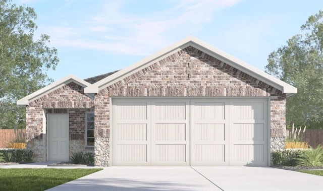 view of front of home with driveway, a garage, fence, and brick siding