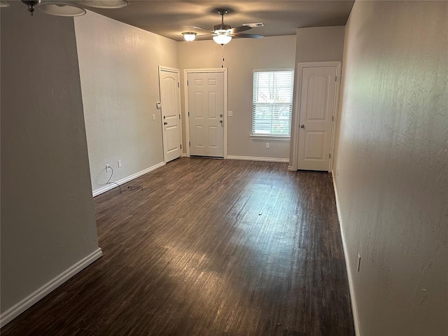 1017 SW 91st St, Oklahoma City, OK 73139 - unfurnished room with a ceiling fan, dark wood-style flooring, and baseboards