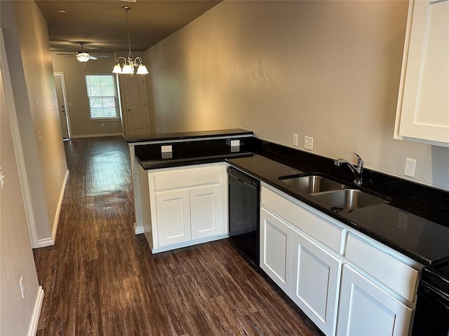 1017 SW 91st St, Oklahoma City, OK 73139 - kitchen featuring black dishwasher, a sink, dark wood-style flooring, dark countertops, and white cabinetry