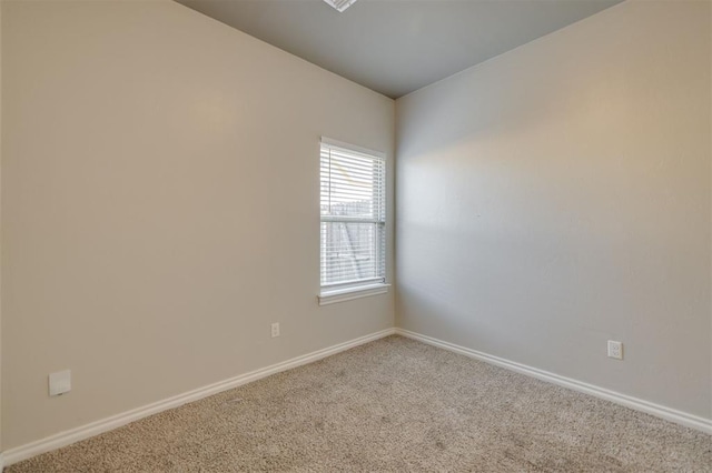 1017 SW 91st St, Oklahoma City, OK 73139 - empty room featuring carpet flooring and baseboards