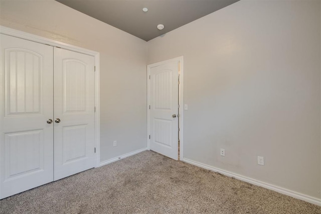 1017 SW 91st St, Oklahoma City, OK 73139 - unfurnished bedroom with carpet flooring, baseboards, and a closet