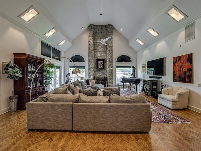 living room featuring a fireplace, high vaulted ceiling, and light parquet flooring