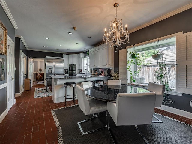 dining space with an inviting chandelier and crown molding