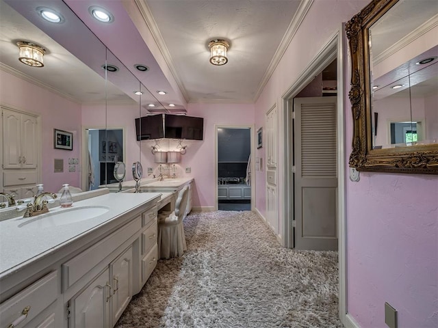 bathroom with vanity and ornamental molding