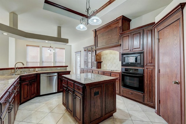 kitchen featuring dishwasher, a center island, a chandelier, decorative light fixtures, and black oven