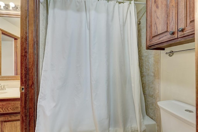 bathroom with vanity and toilet