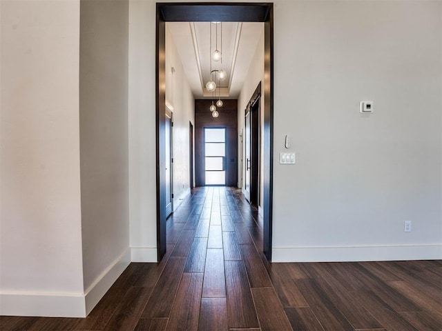 hallway with dark wood-type flooring