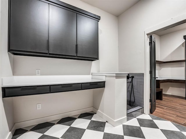 washroom with light hardwood / wood-style floors