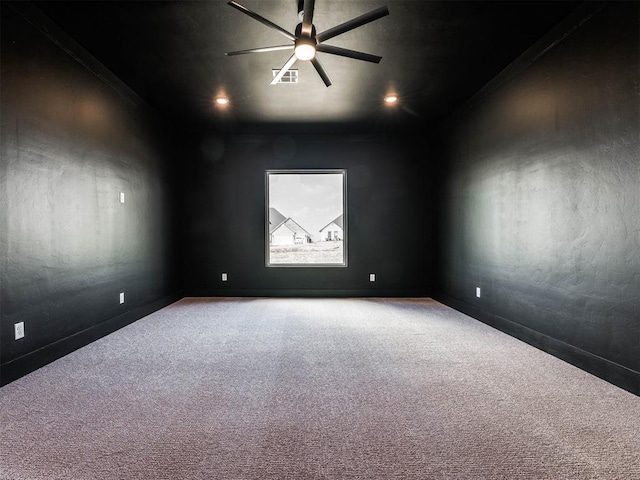 unfurnished room with carpet flooring, ceiling fan, and ornamental molding