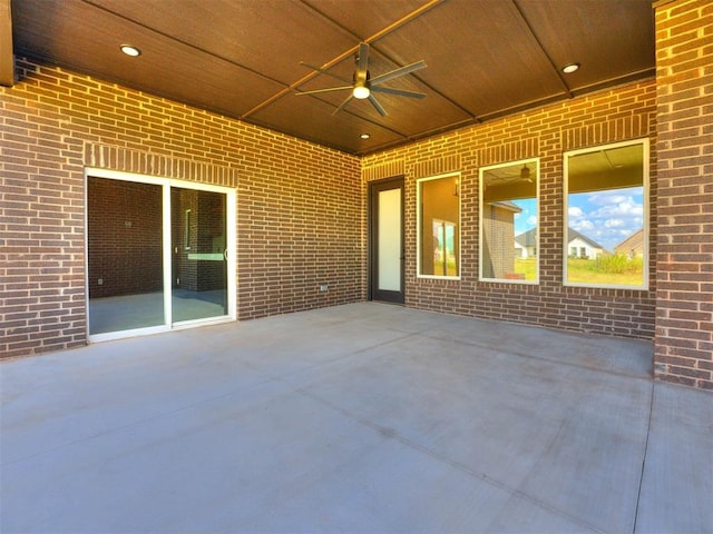 view of patio featuring ceiling fan