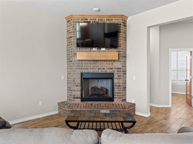 living room featuring hardwood / wood-style floors and a fireplace