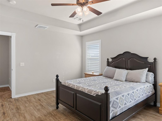 bedroom featuring ceiling fan and light wood-type flooring