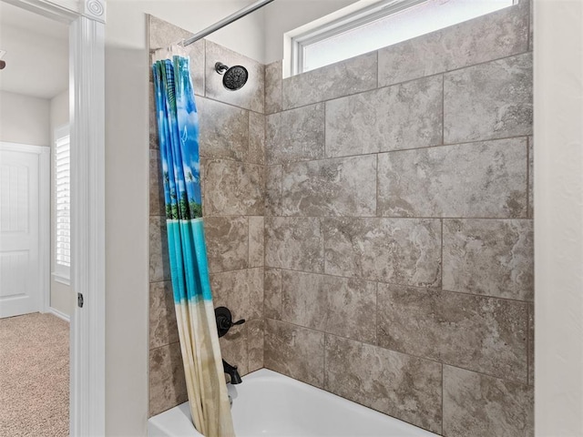 bathroom featuring shower / bath combo