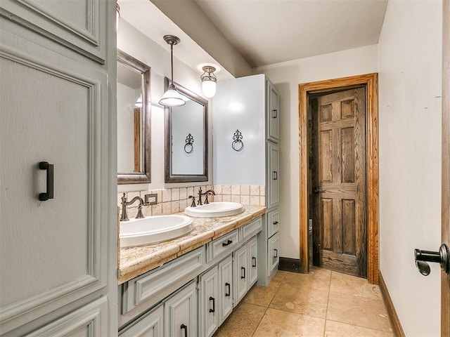 bathroom with vanity and tile patterned floors