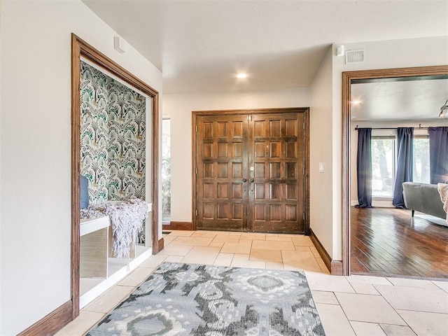 entrance foyer featuring light wood-type flooring