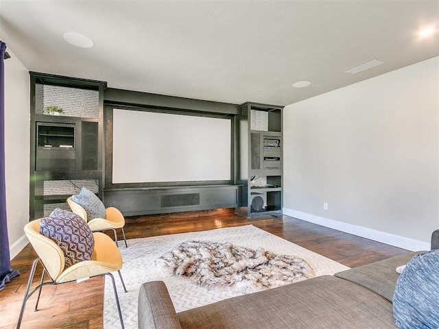 home theater with wood-type flooring