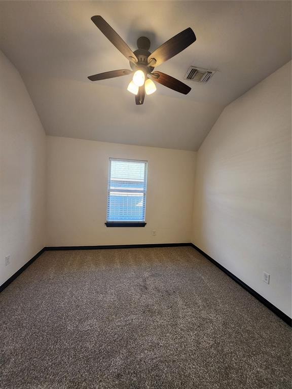 bonus room featuring ceiling fan, carpet, and vaulted ceiling