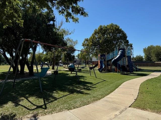 view of community with a playground and a lawn