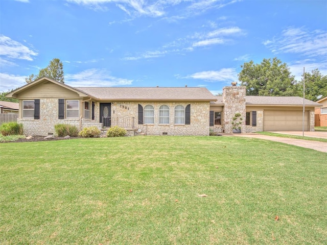 ranch-style house with a garage and a front lawn