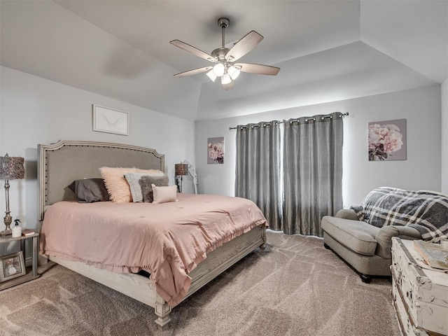 carpeted bedroom with ceiling fan and lofted ceiling