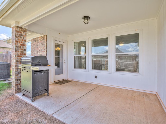 view of patio featuring grilling area and central air condition unit