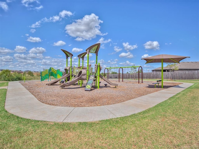 view of jungle gym with a lawn