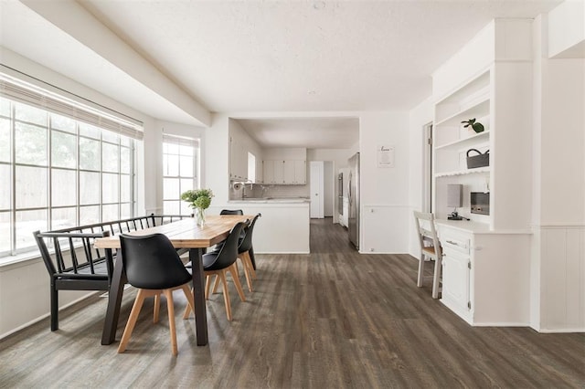 dining space with dark wood-type flooring