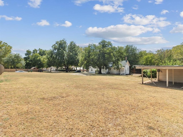 view of yard featuring a carport