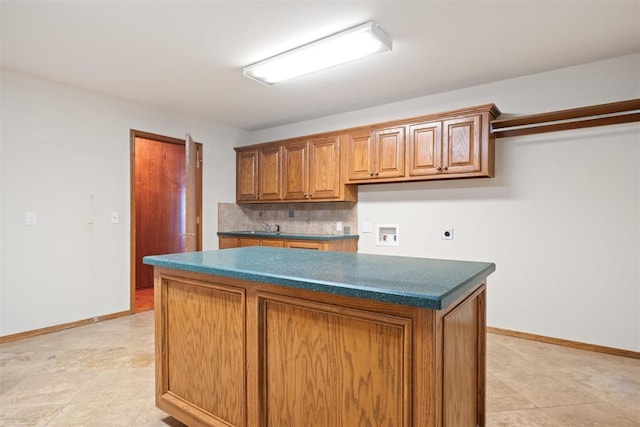 kitchen featuring a kitchen island and decorative backsplash