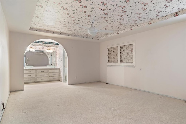 unfurnished bedroom with light colored carpet